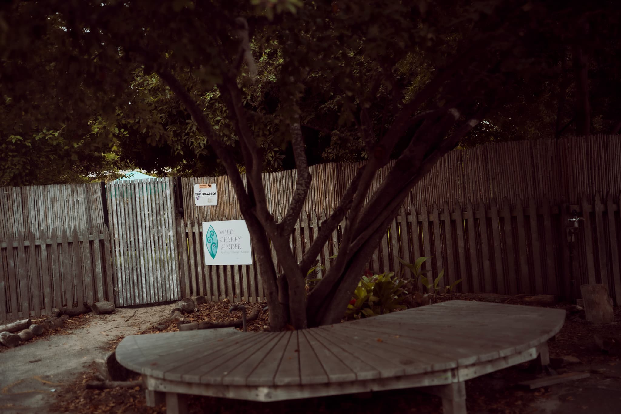 Kindergarten gate and gathering seat.