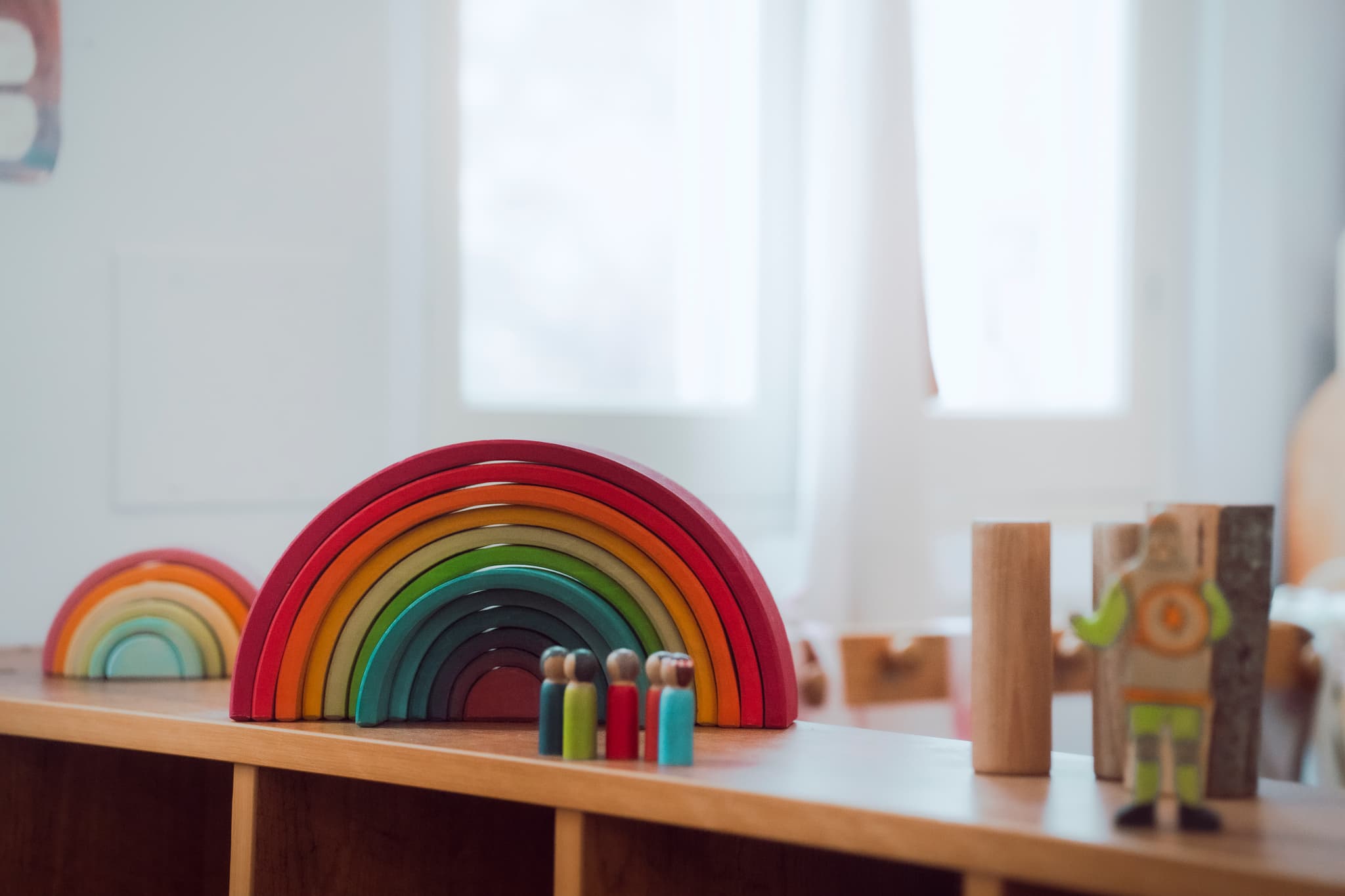 Grimm's rainbow stacker and natural wooden toys